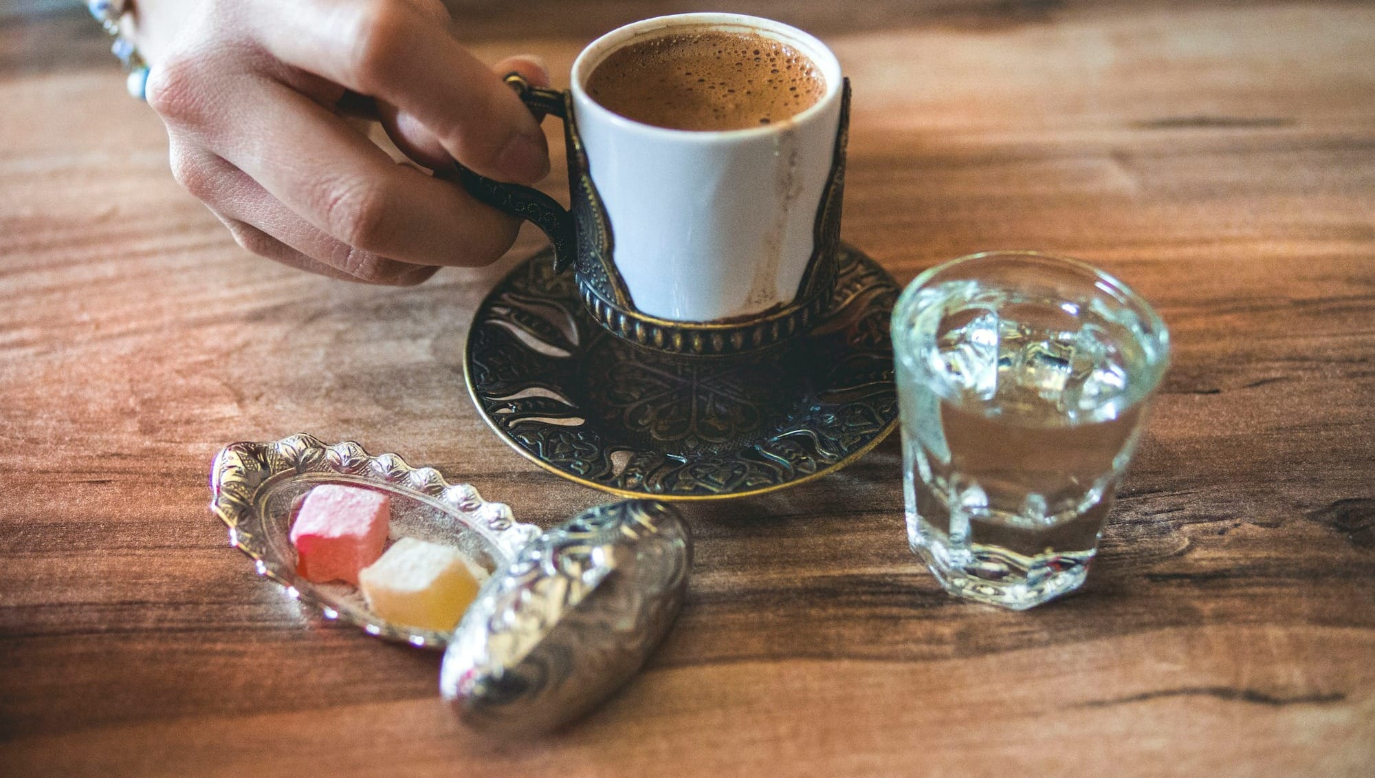 white ceramic cup near mug